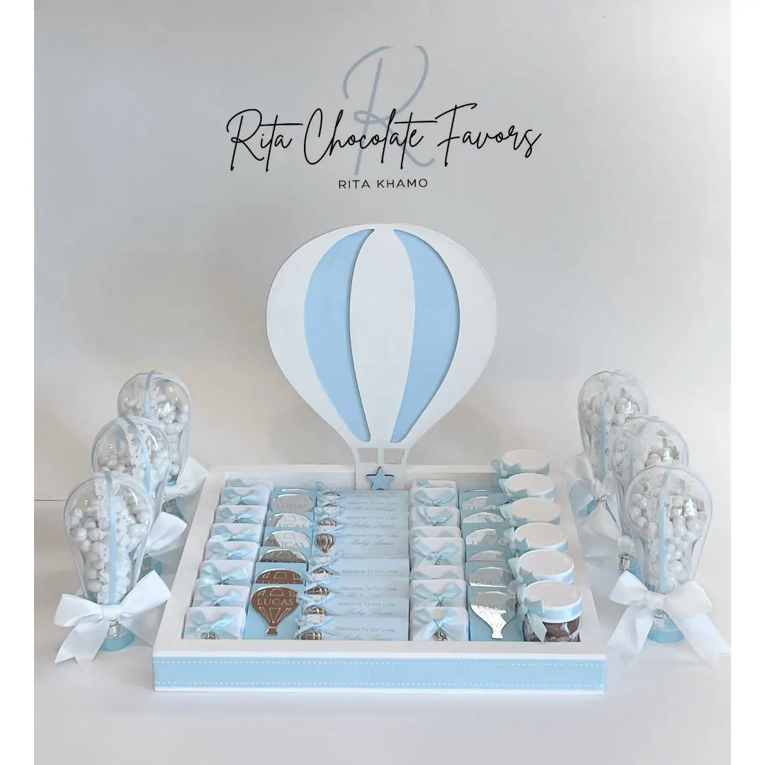 Pink and white chocolate baby shower favors