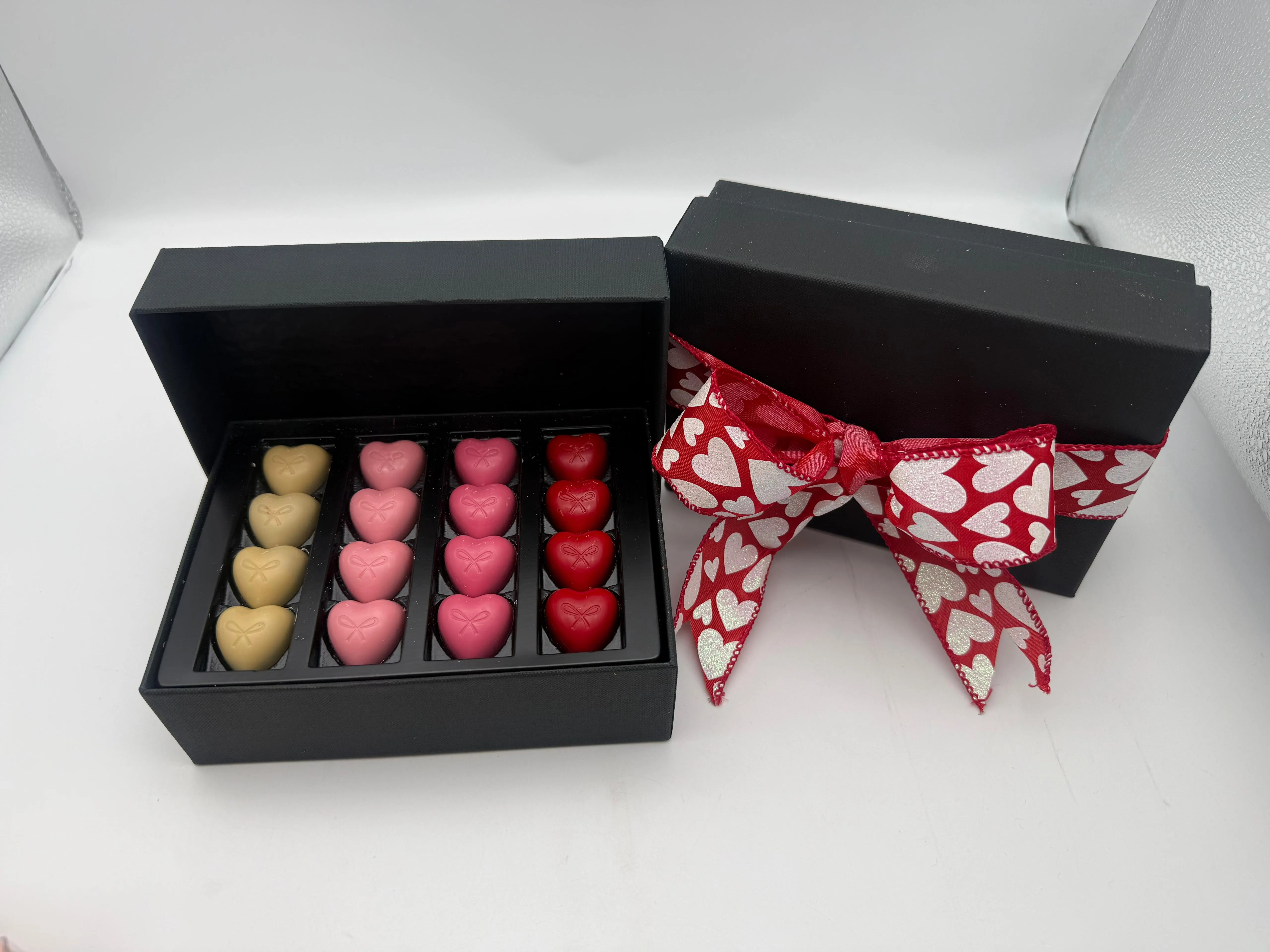 Heart-shaped Valentine's Day chocolates in a gift box