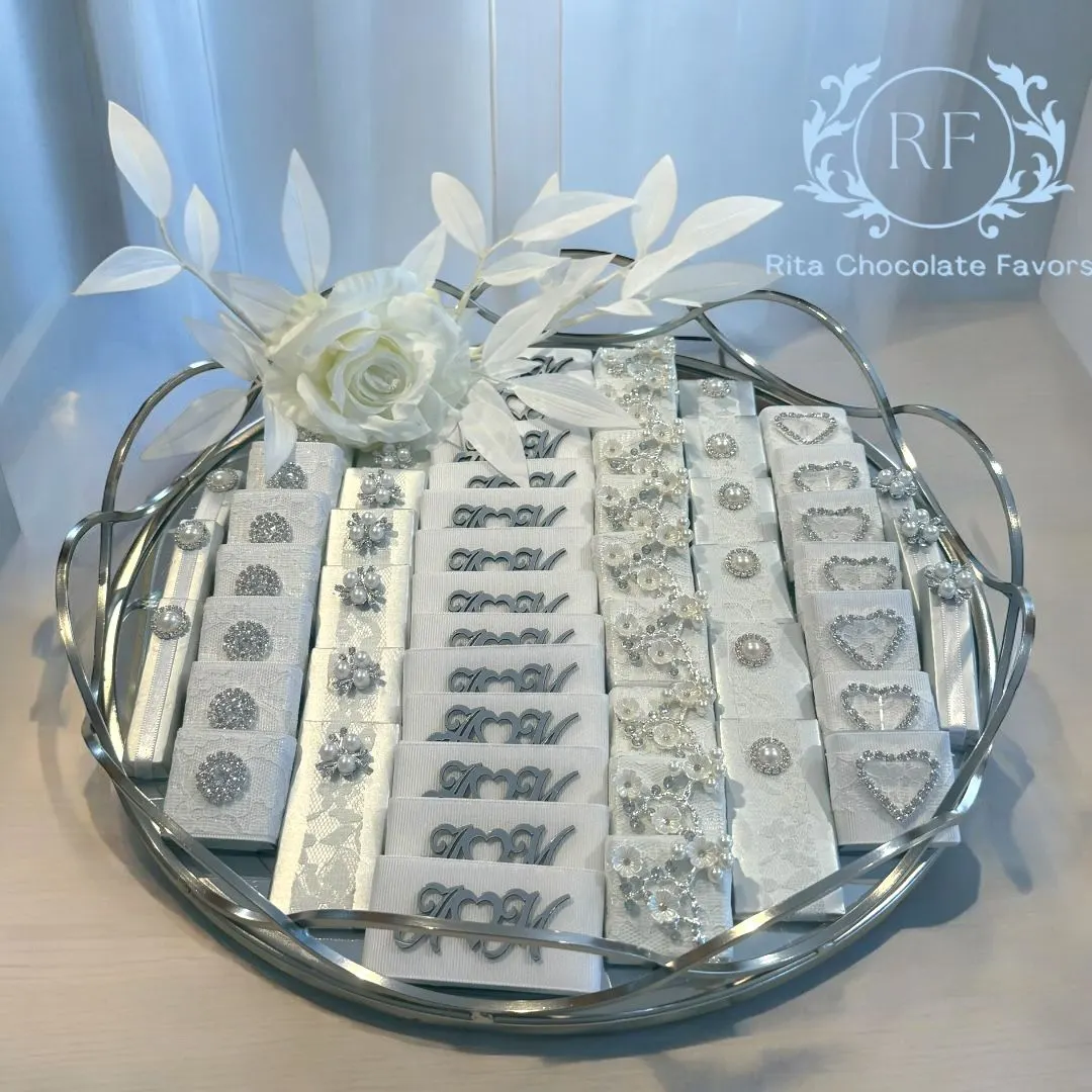 Elegant chocolate wedding favors with gold accents