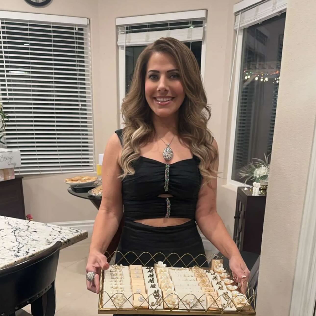 Rita, founder of Rita's Chocolate Favors, in her San Diego kitchen